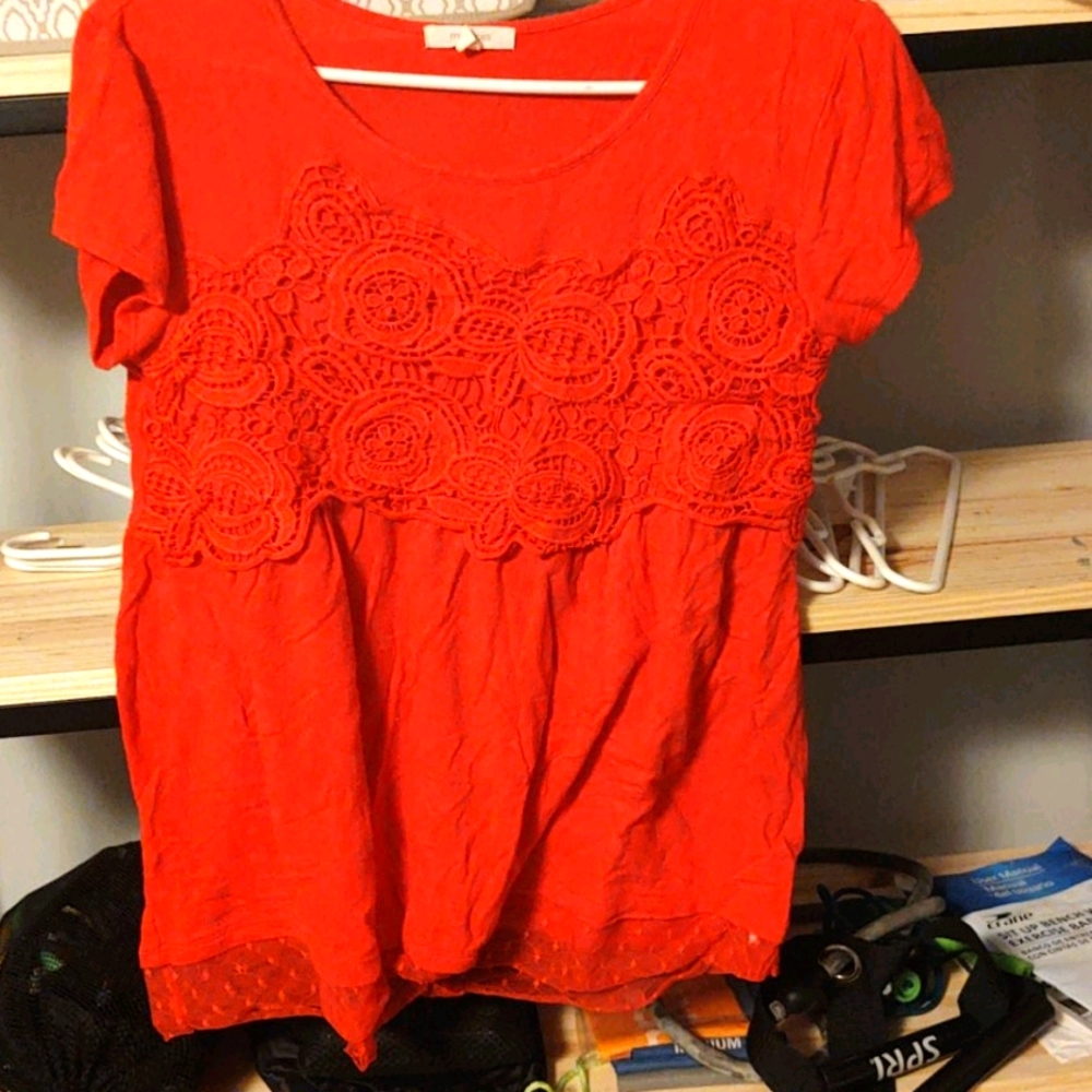 Red top with embroidery